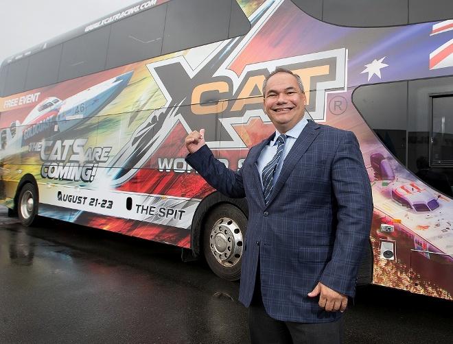 City of Gold Coast Mayor Tom Tate with one of the Surfside buses wrapped in XCAT branding, thanks to a partnership with TAG /Transit Australia Group, which will be making their way around the Gold Coast - 2015 UIM XCAT World Series © Karien Jonckheere